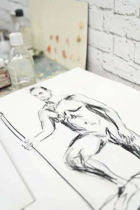 Desenho a tinta de uma figura reclinada, feito numa sessão de modelo ao vivo